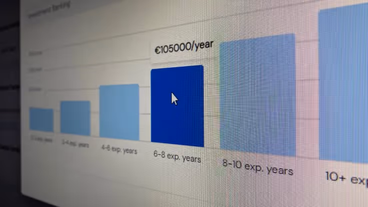 A member reviewing salary data on a laptop